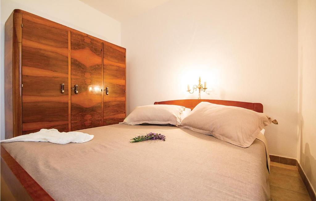 Łóżko lub łóżka w pokoju w obiekcie Holiday Home Vrcevan I
