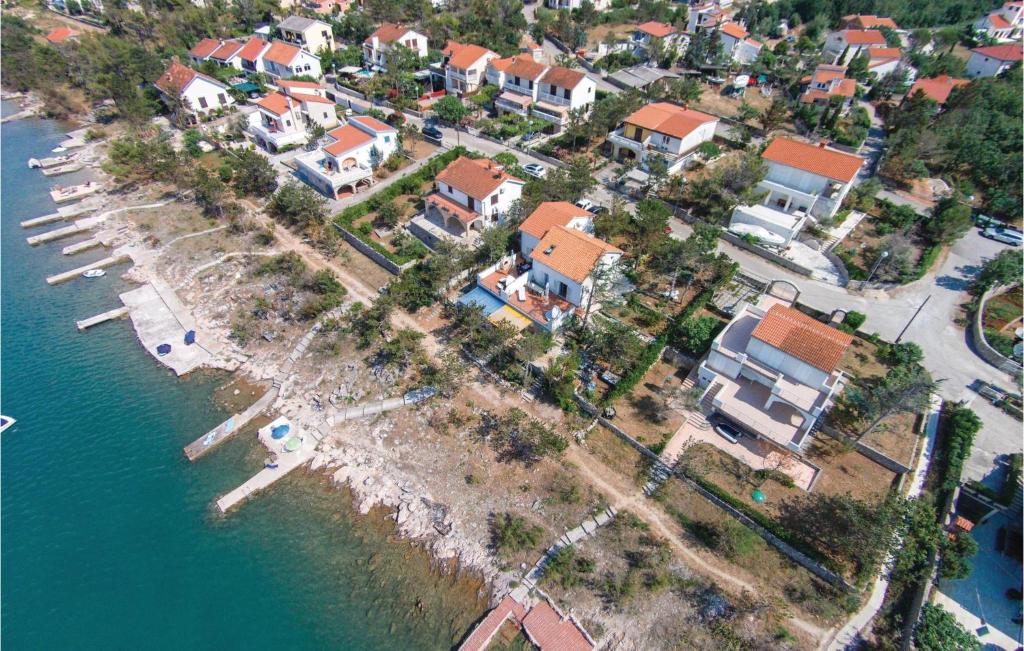 an aerial view of a town next to the water at Stunning Home In Klimno With Kitchen in Klimno