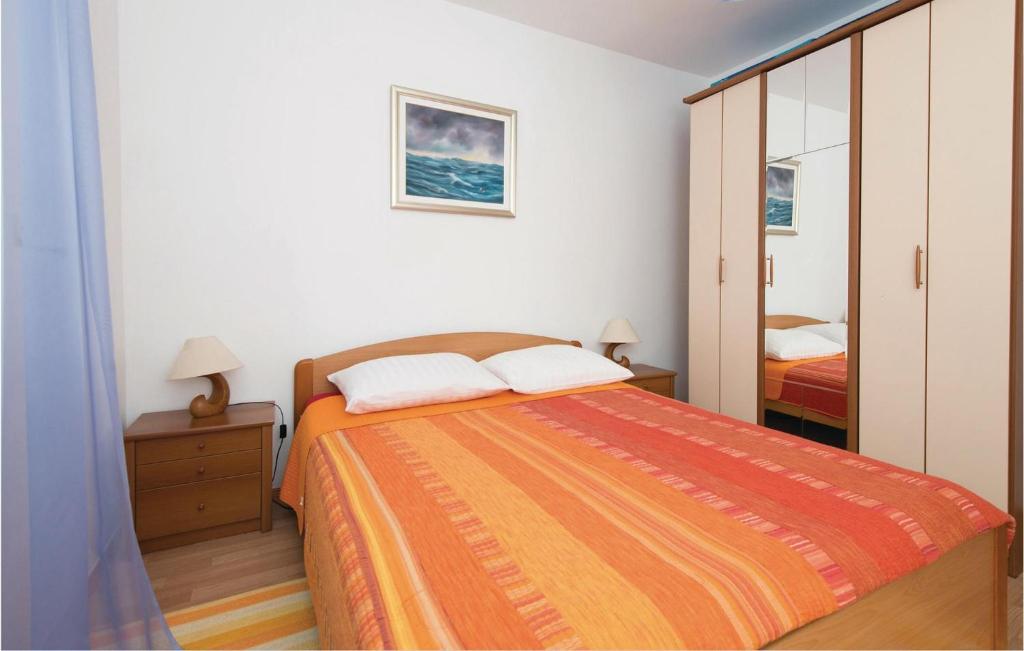 Posteľ alebo postele v izbe v ubytovaní Apartment Ston With Sea View Iv