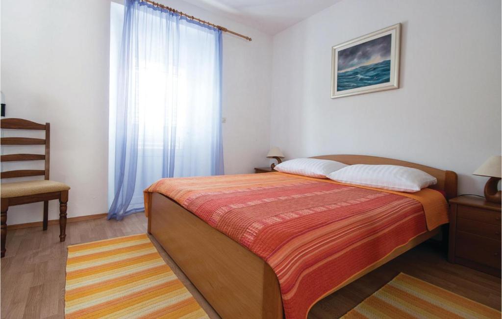 Posteľ alebo postele v izbe v ubytovaní Apartment Ston With Sea View Iv