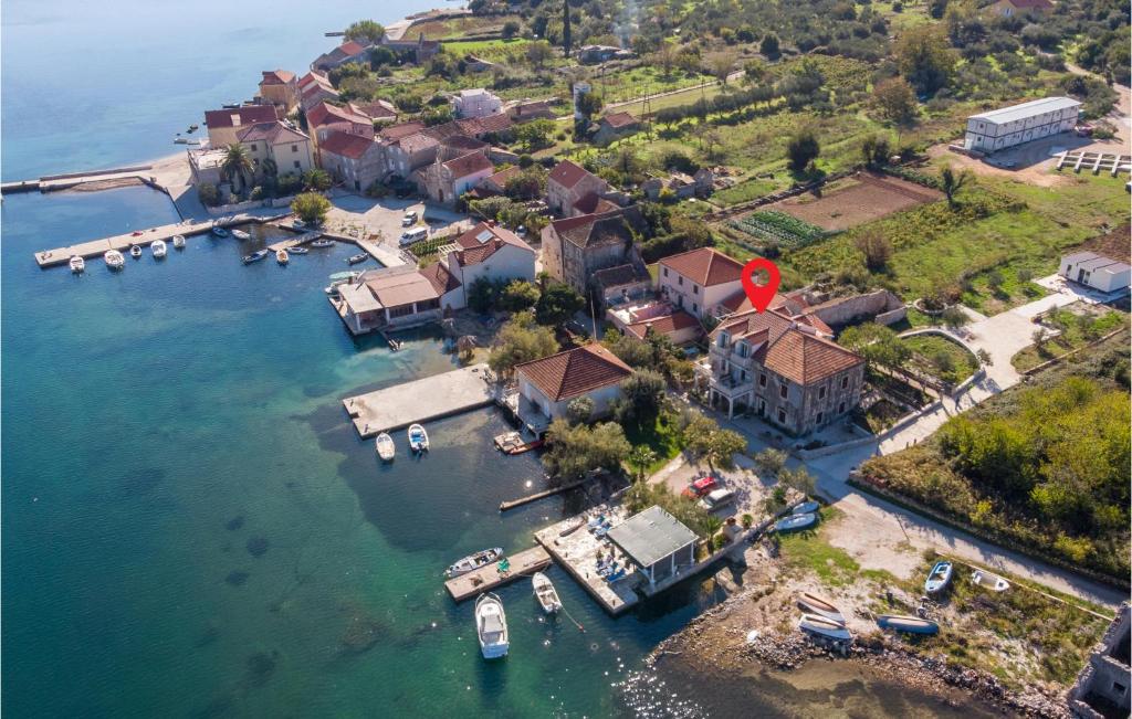 an aerial view of a house on the water at Beautiful Apartment In Ston With 2 Bedrooms And Wifi in Ston