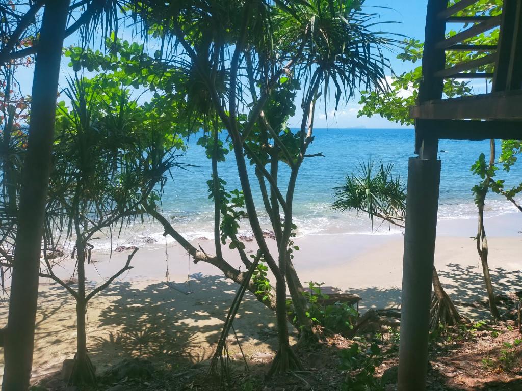 a view of the beach from the house at Jungle Hill Beach Bungalow in Ko Jum