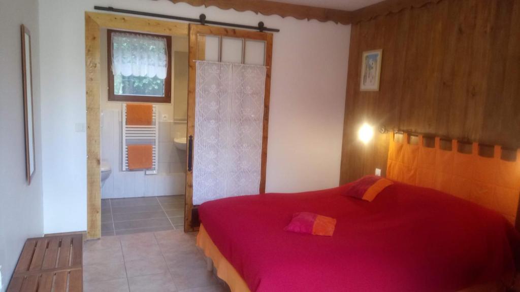 Postel nebo postele na pokoji v ubytování Paysannerie des Versanes - Chambres et gîte