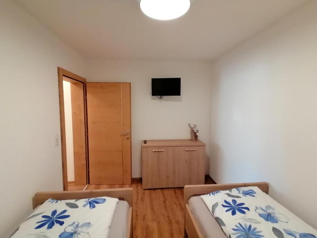 Postel nebo postele na pokoji v ubytování Bergluft