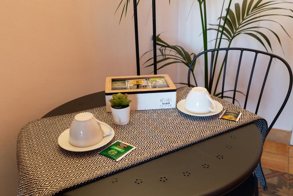 Příslušenství pro přípravu čaje a kávy v ubytování B&B Bellini
