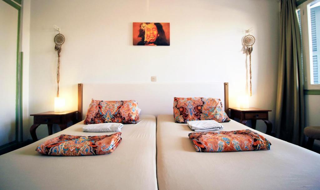 Postel nebo postele na pokoji v ubytování Lima Sol House
