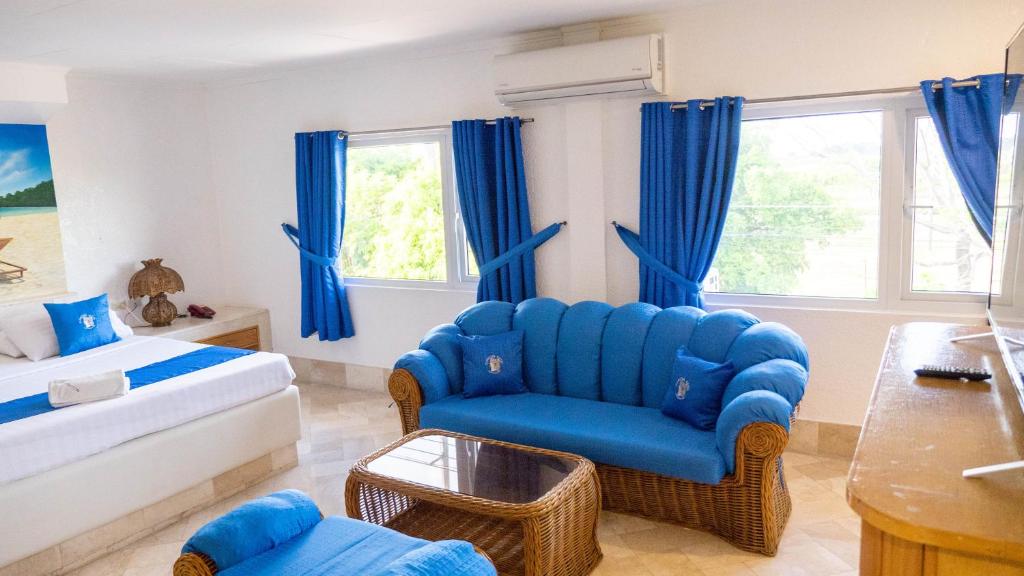 Postel nebo postele na pokoji v ubytování Clarkton Hotel Apartment