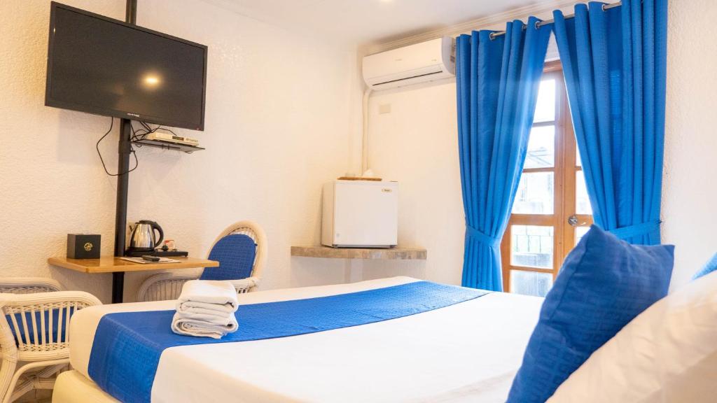 TV a/nebo společenská místnost v ubytování Clarkton Hotel Apartment