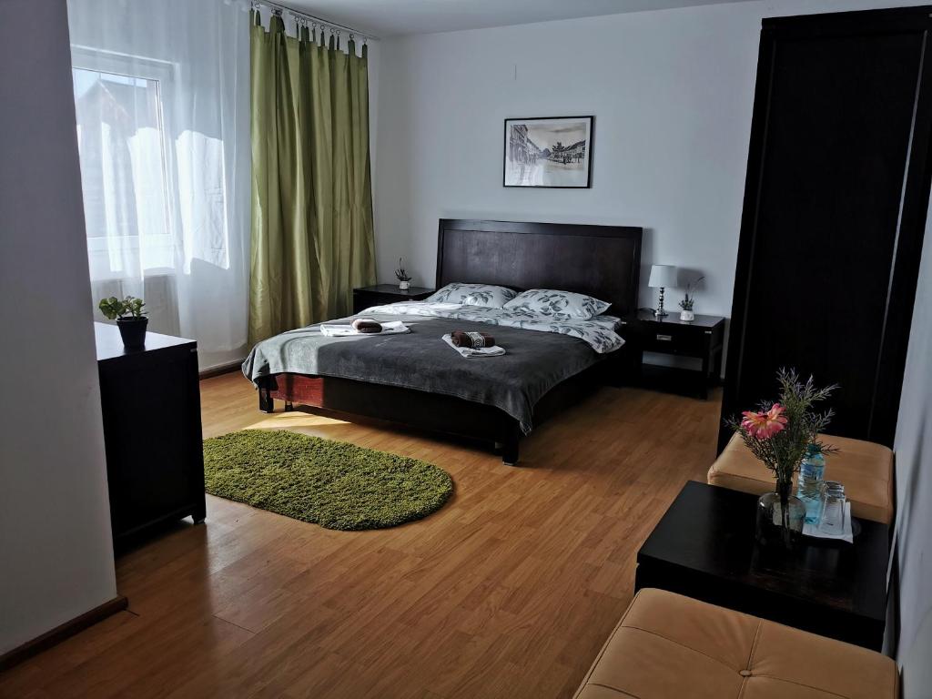Postel nebo postele na pokoji v ubytování Casa de oaspeti Wallendorf Bistrita Unirea