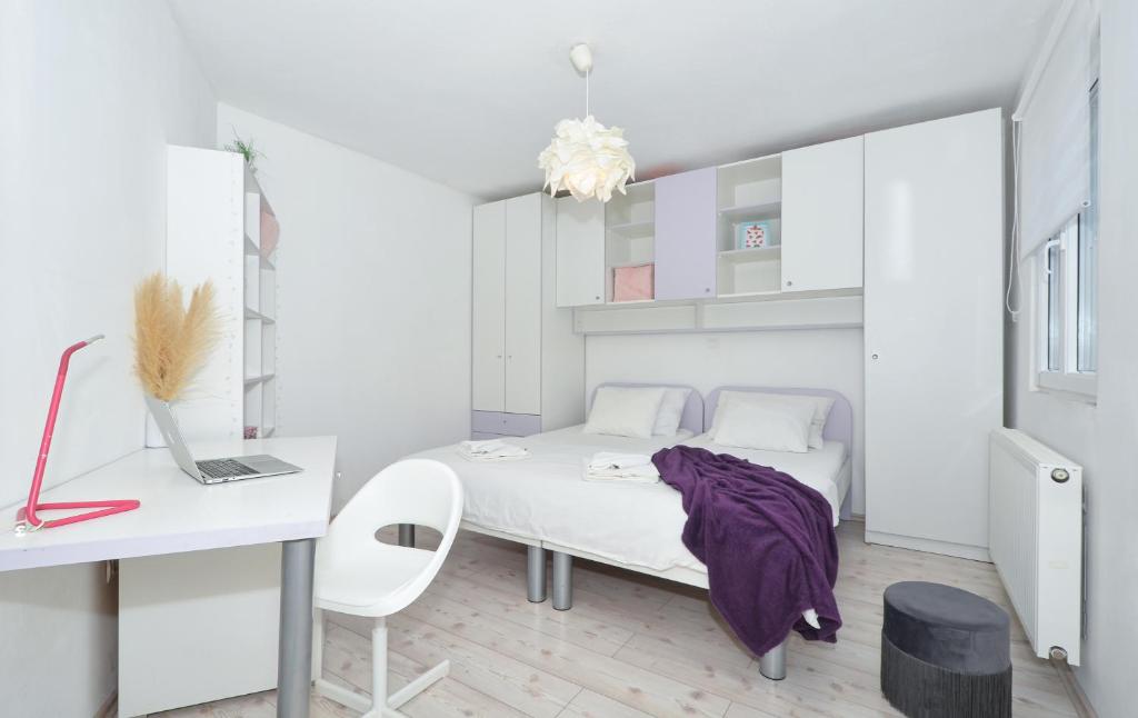 Posteľ alebo postele v izbe v ubytovaní Copacabana Beach Apartments