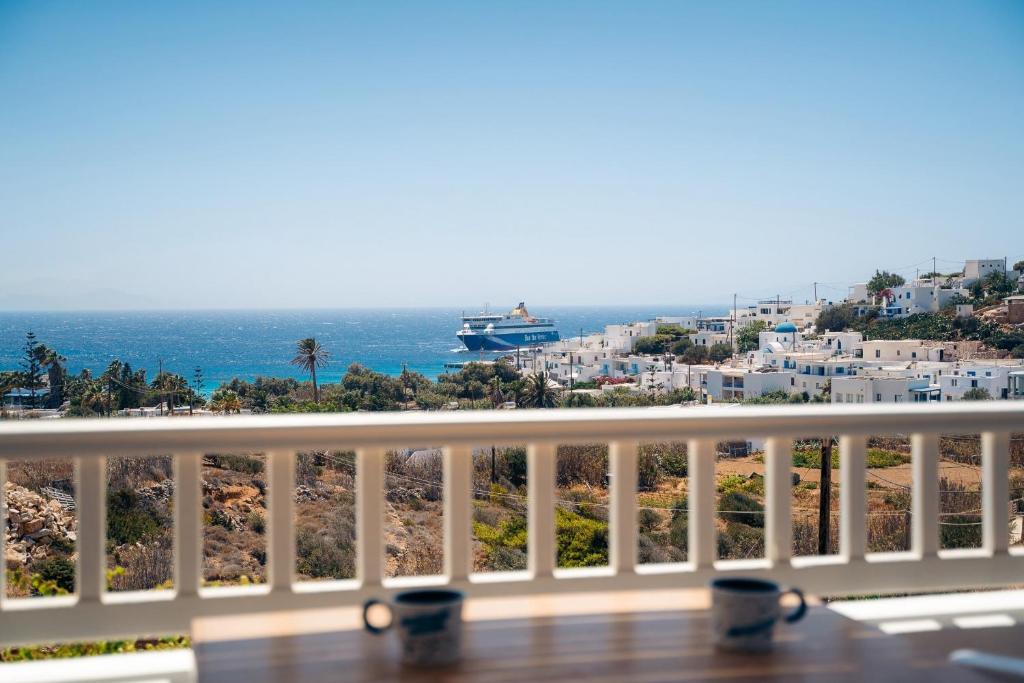 a view of the ocean from a balcony at Pothiti Studios in Donoussa