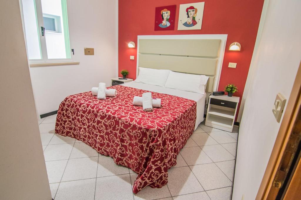Letto o letti in una camera di Hotel Mizar