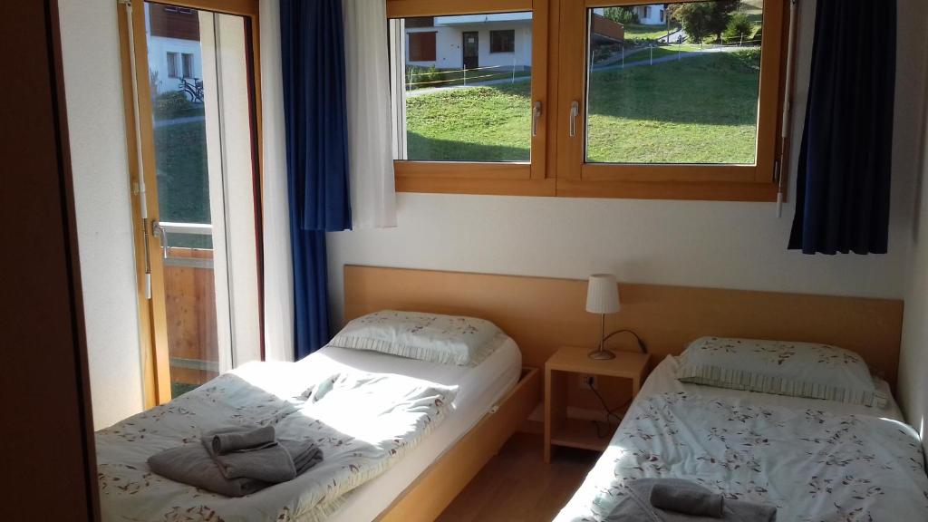 Postel nebo postele na pokoji v ubytování Haus Snow Fun B
