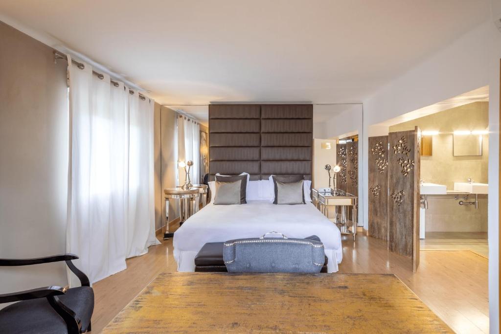 Postel nebo postele na pokoji v ubytování Hostal Parque Ibiza