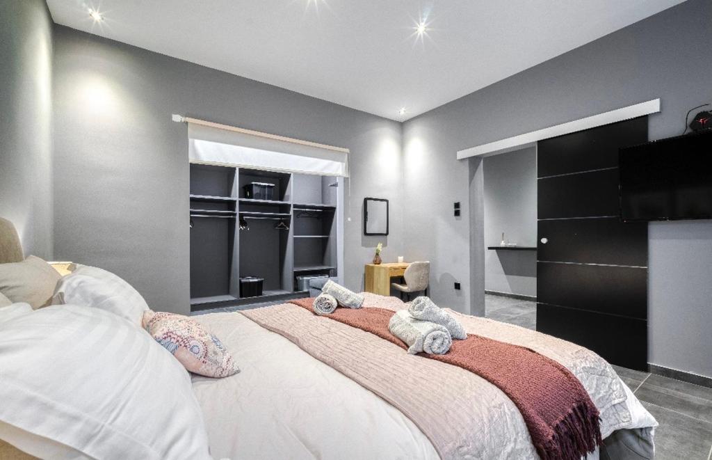 Posteľ alebo postele v izbe v ubytovaní L apartment
