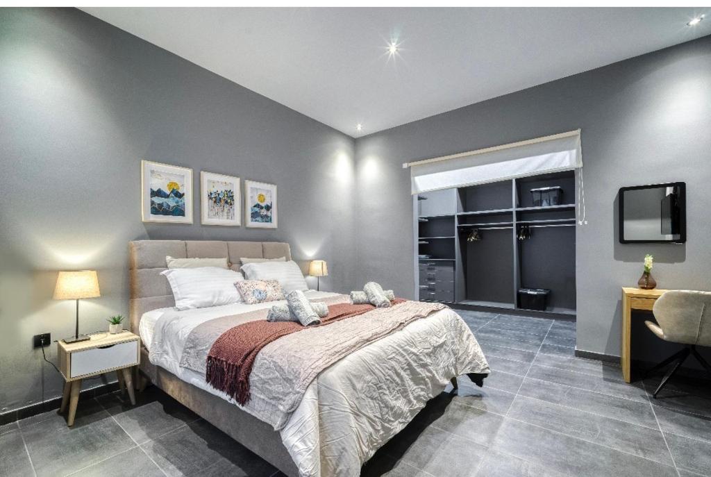Posteľ alebo postele v izbe v ubytovaní L apartment