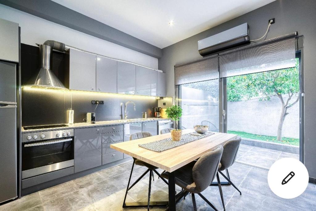 Kuchyňa alebo kuchynka v ubytovaní L apartment