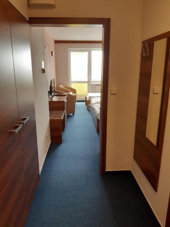 Postel nebo postele na pokoji v ubytování Apartmán Wellness hotel Frymburk