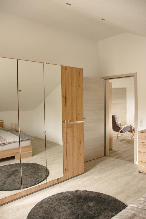 Postel nebo postele na pokoji v ubytování Gästehaus Mittendrin