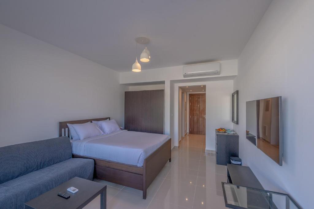 TV a/nebo společenská místnost v ubytování VESTA - El Gouna Residence