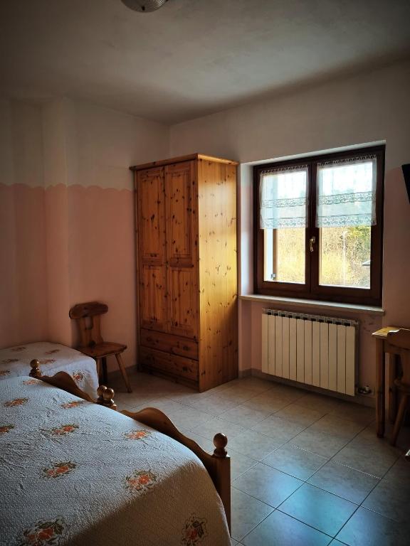 Postel nebo postele na pokoji v ubytování Hotel Piccola Mantova