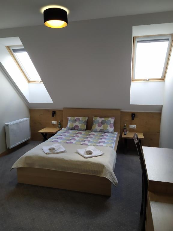 Posteľ alebo postele v izbe v ubytovaní Hotel Regina