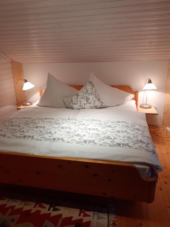 Postel nebo postele na pokoji v ubytování Apartmenthaus AMELIE
