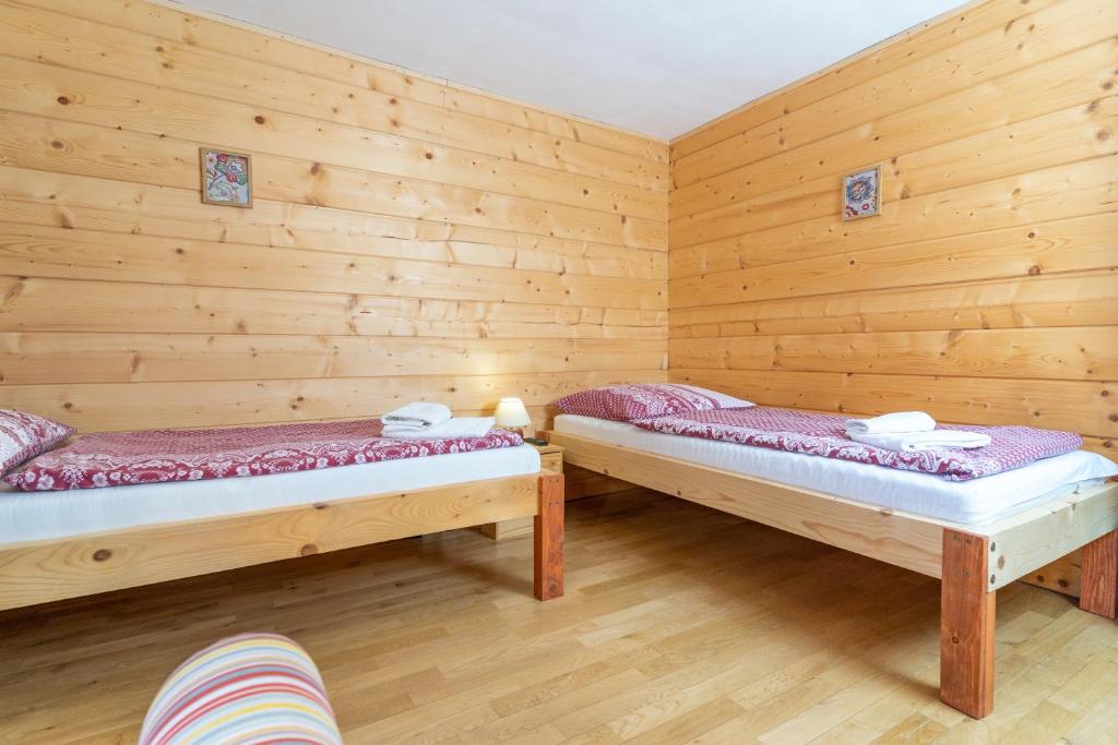Postel nebo postele na pokoji v ubytování Penzión Javorina