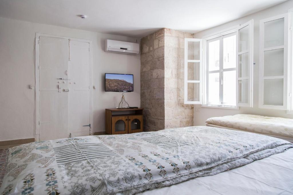 Postel nebo postele na pokoji v ubytování Alexandra House