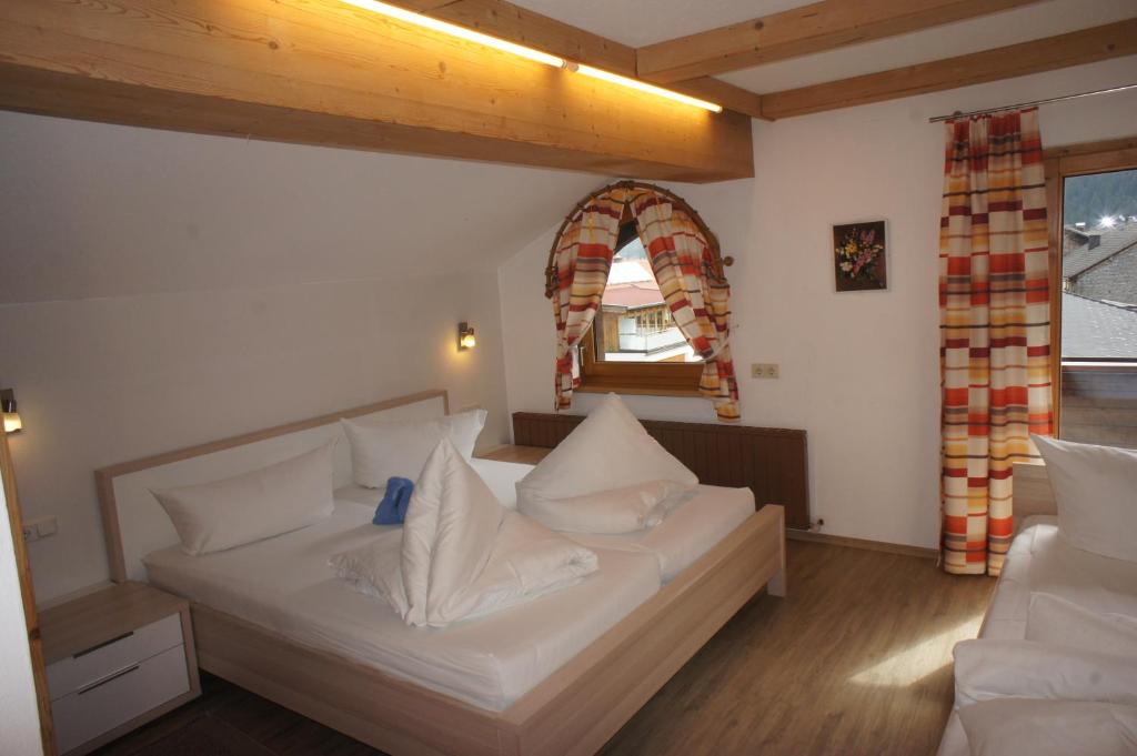 Posteľ alebo postele v izbe v ubytovaní Appartements Gärtner