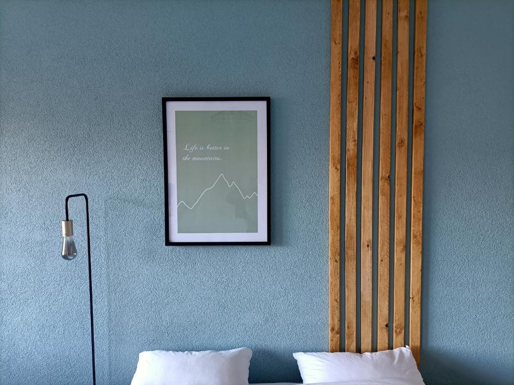 Postel nebo postele na pokoji v ubytování Studio lumineux bien placé en ville de Sion