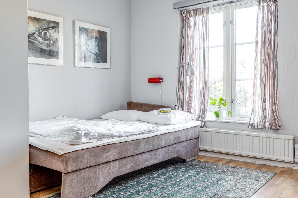 Postel nebo postele na pokoji v ubytování STF Baskemölla Hostel
