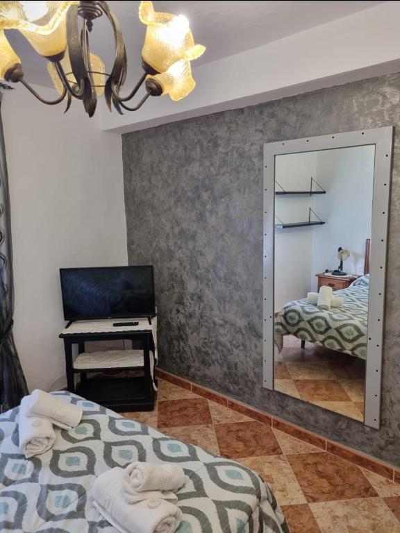 Posteľ alebo postele v izbe v ubytovaní Casa Francisca en el casco antiguo