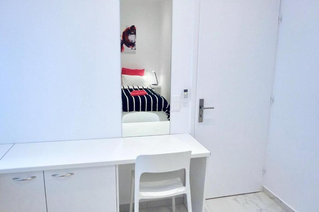 Posteľ alebo postele v izbe v ubytovaní Cozy apartment in the center of Athens