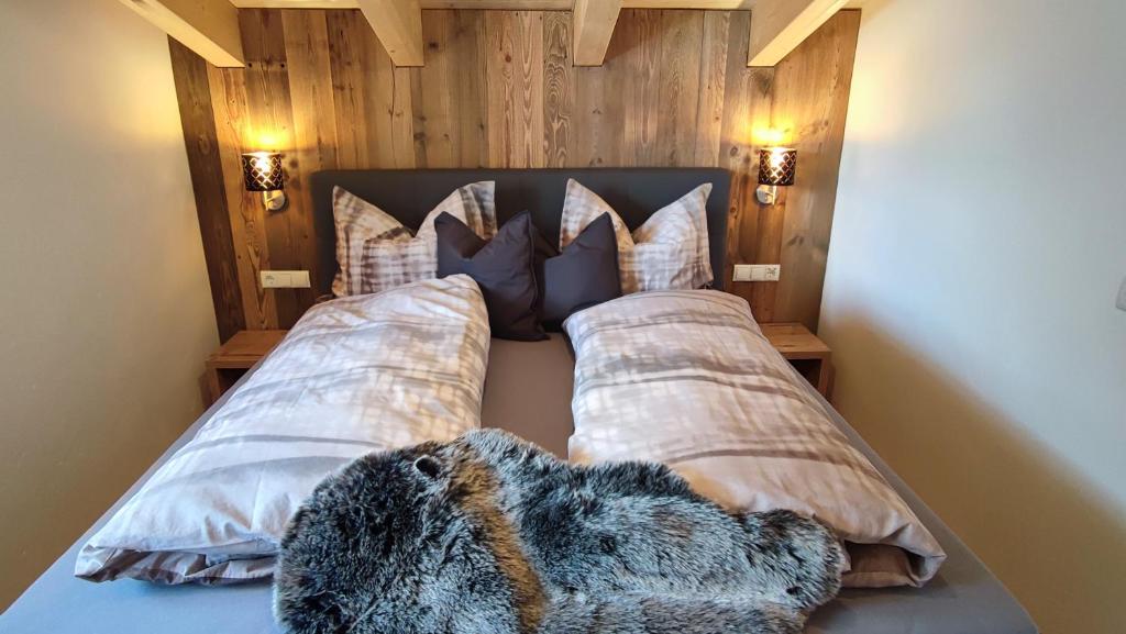 Postel nebo postele na pokoji v ubytování Alpenchalet Valentin