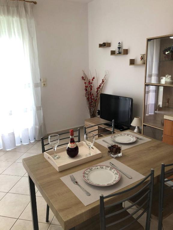 Televízia a/alebo spoločenská miestnosť v ubytovaní Apartment sea view