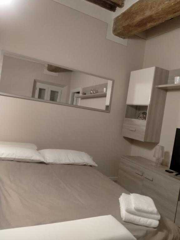 Postel nebo postele na pokoji v ubytování Casa Toscanella