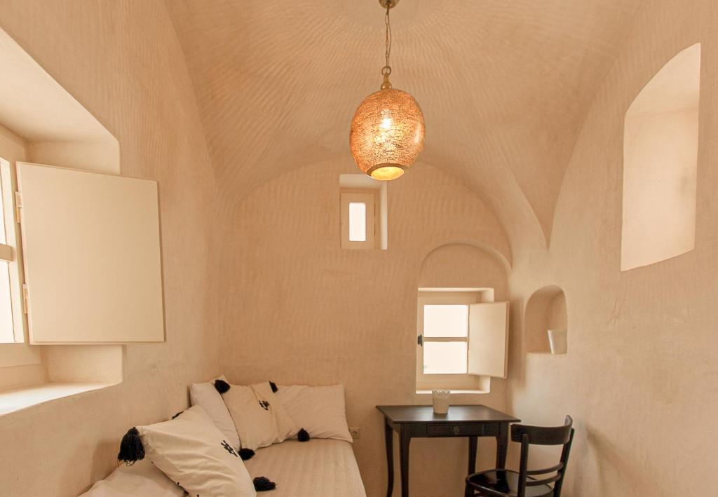 Llit o llits en una habitaci&oacute; de Castelli Torre