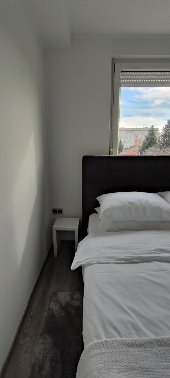 Postel nebo postele na pokoji v ubytování Perfect Place 33