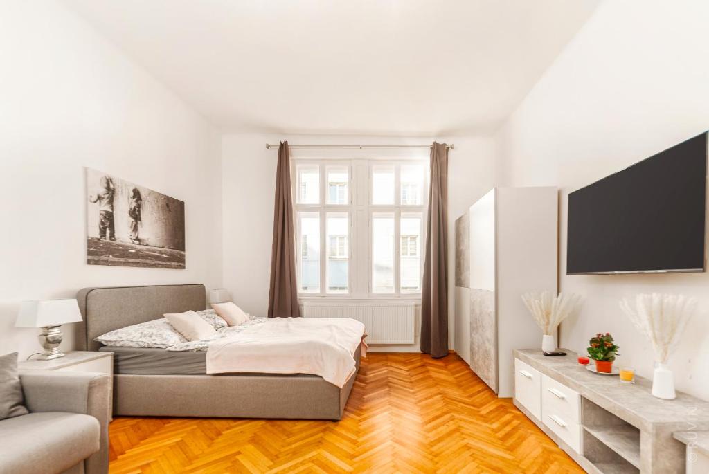 Ліжко або ліжка в номері City Apartment, central, 2 min to U1 Keplerplatz