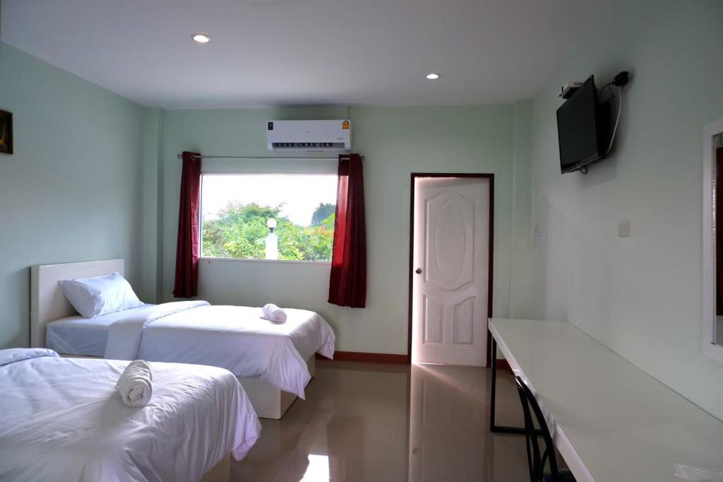 โรงแรมคอมม่อนเวลธ์ Commonwealth Hotel&Resort - Deluxe Twin Room