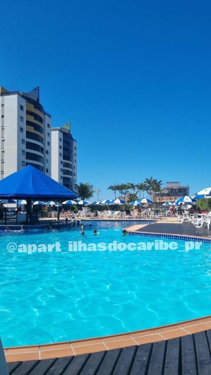 Bazén v ubytování Apto Cond Ilhas do Caribe - Pr - Beira Mar nebo v jeho okolí