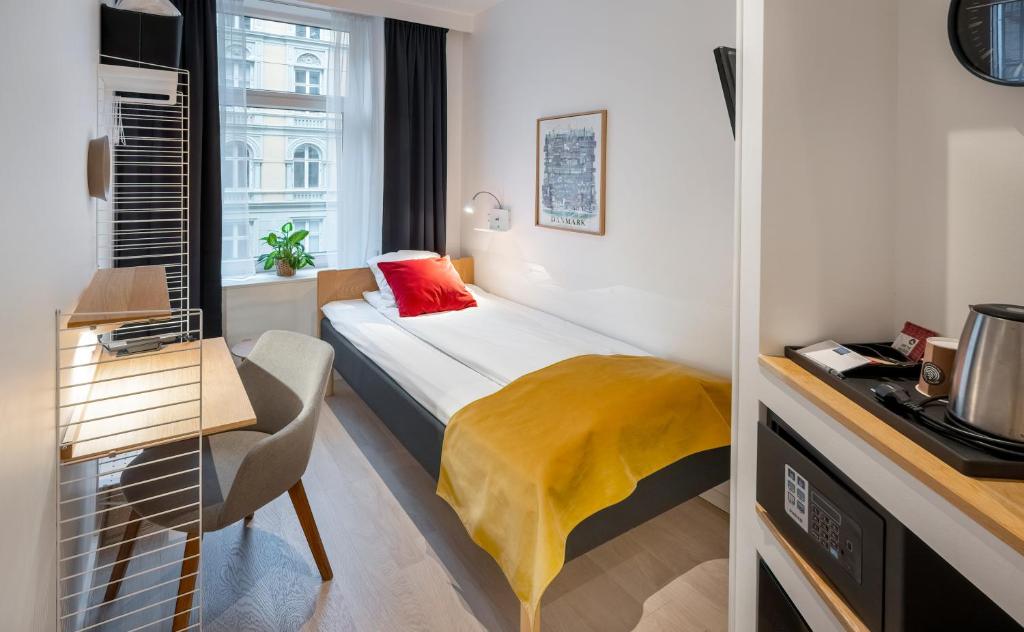 Postel nebo postele na pokoji v ubytování Go Hotel Ansgar