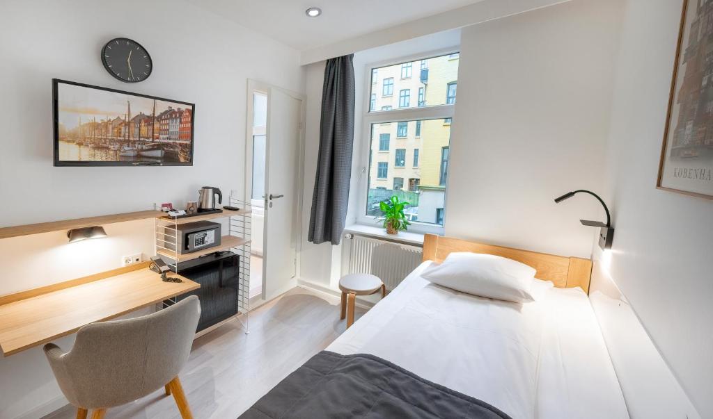 Postel nebo postele na pokoji v ubytování Go Hotel Ansgar