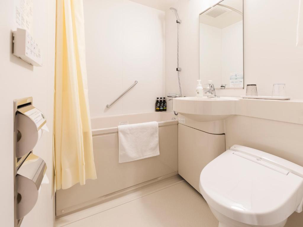 Koupelna v ubytování Sotetsu Fresa Inn Daimon