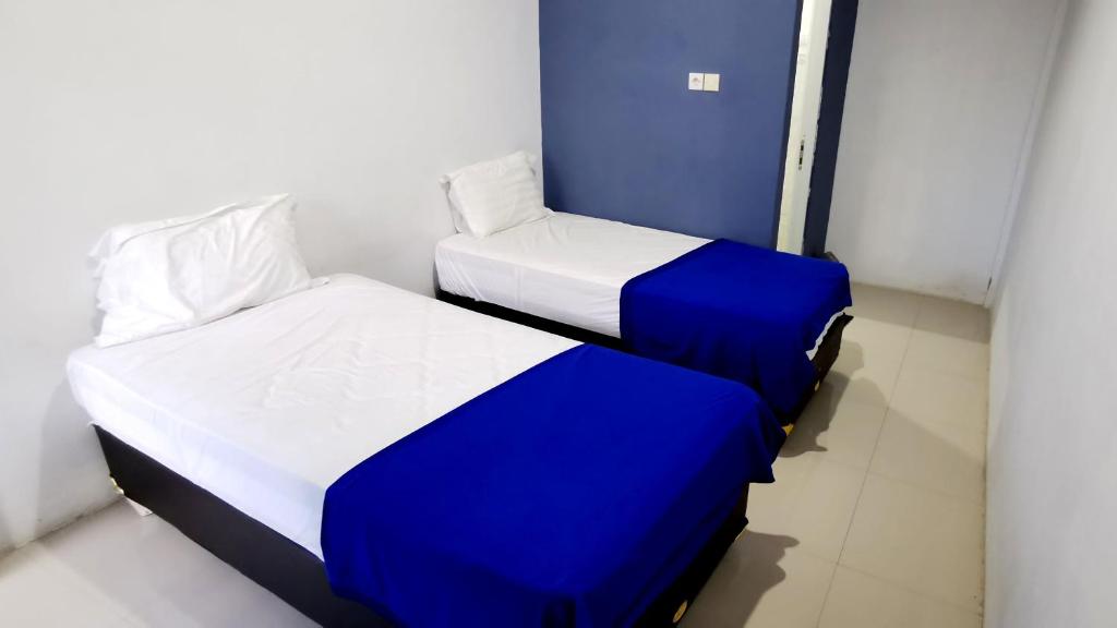 Hotel Aqiilah Syariah - Habitación Gemela De Presupuesto