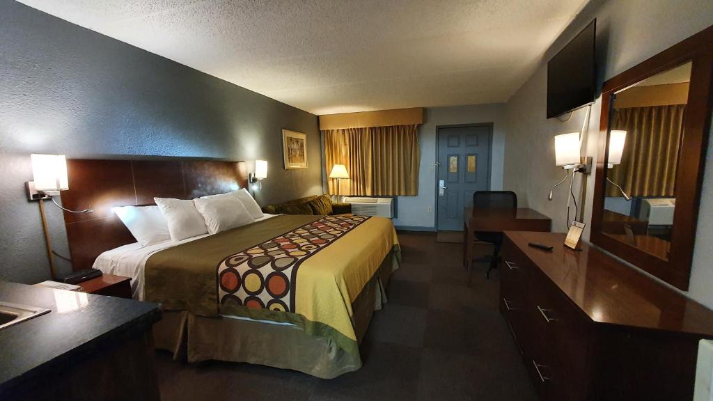 Postel nebo postele na pokoji v ubytování South Padre Island Inn