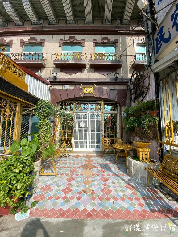 an entrance to a building with a tile floor at Hi Young Castle in Hengchun South Gate