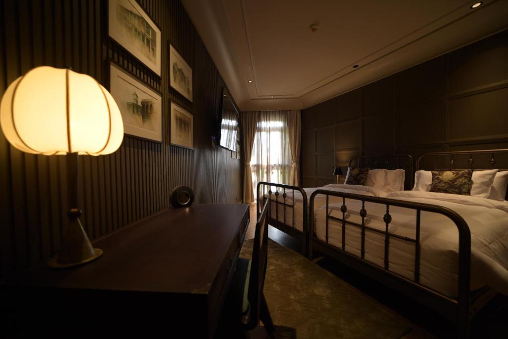 Postel nebo postele na pokoji v ubytování Hotel Verdigris