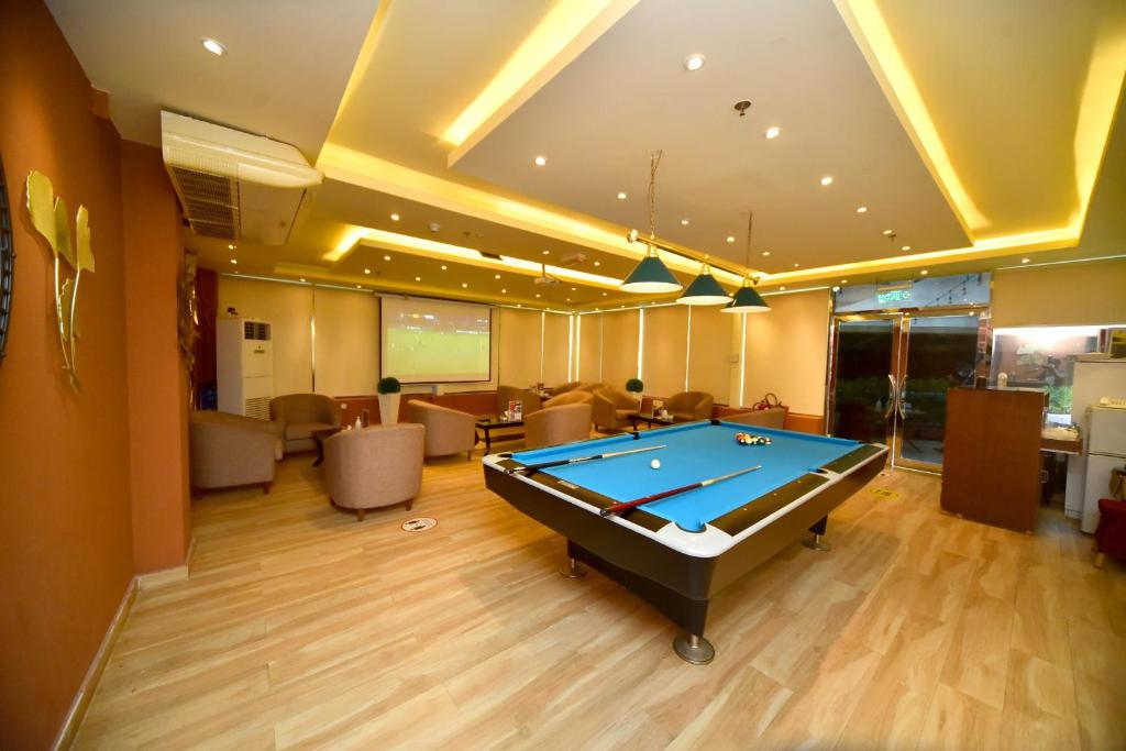 a billiard room with a pool table in it at Emirates Stars Hotel Apartments Dubai in Dubai